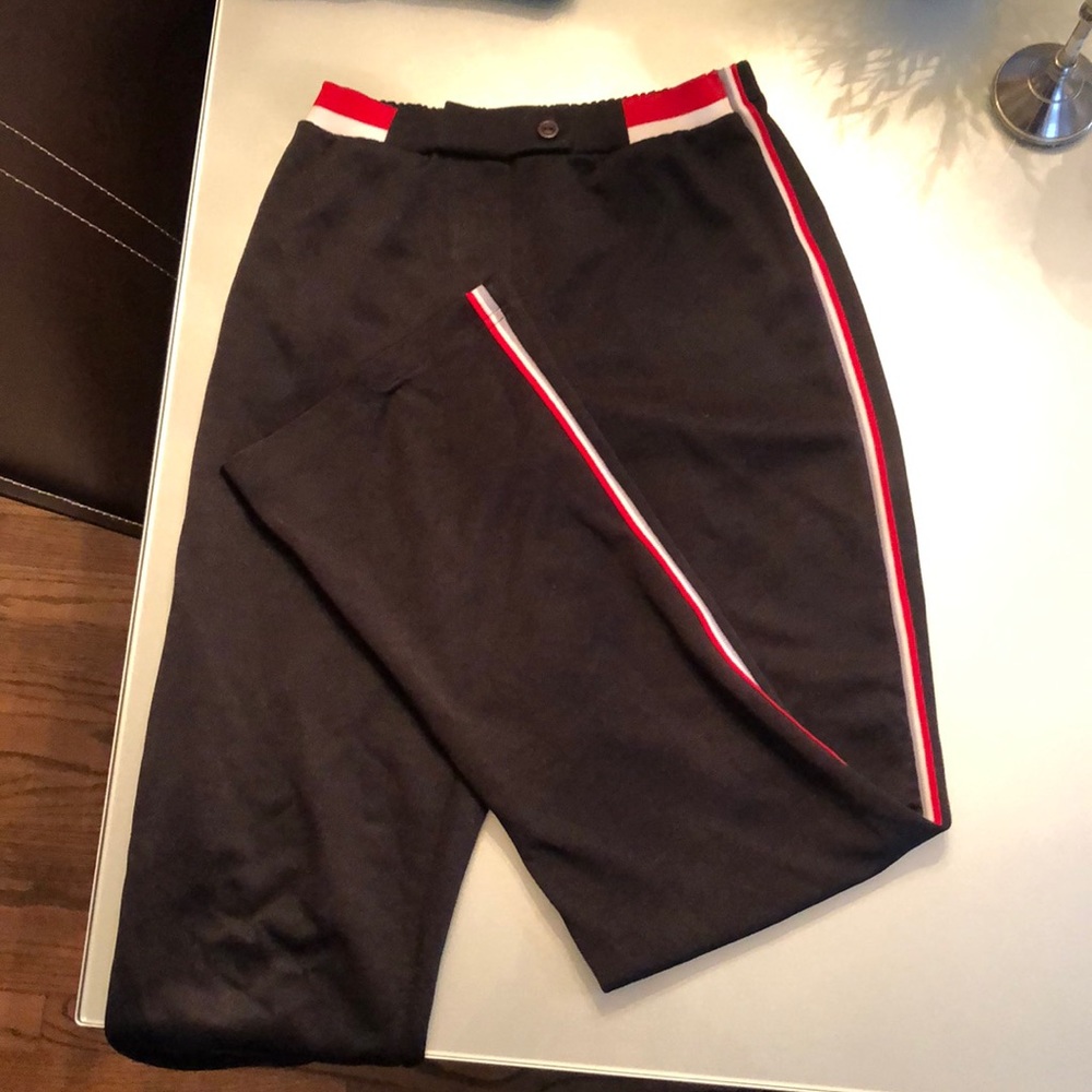 Black sweatpants with red & white stripe